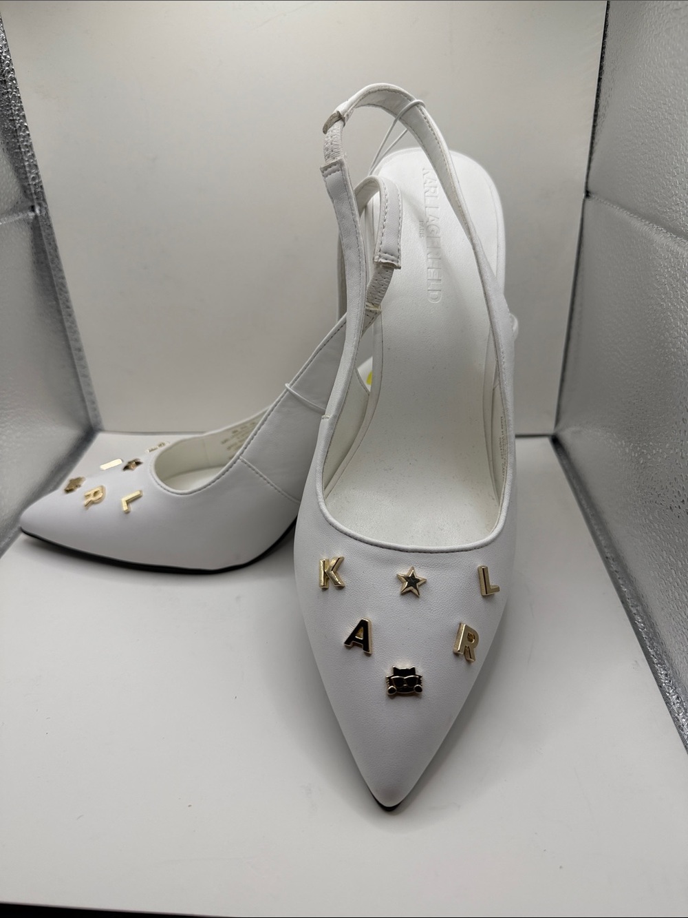 Karl Lagerfeld White Pointed-Toe Slingback Pumps with Gold Letter Accents